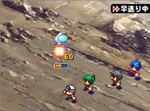 岩場の戦闘で、小型のUFOにオレンジの閃光が走り「60」のダメージが出ている画面
